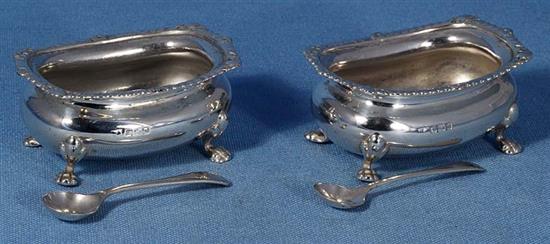 A pair of Victorian silver circular bun salts, 7.8oz/244 grams.